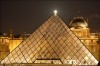 Moon rising over the Louvre pyramid in Paris, France, photo by Aidan Egan